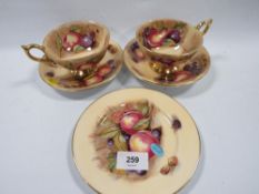 Two Aynsley Orchard Gold cups and saucers together with a similar side plate