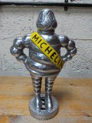 An aluminium Michelin figure **
