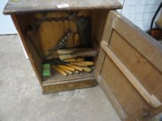 A wooden storage cabinet and contents - tools