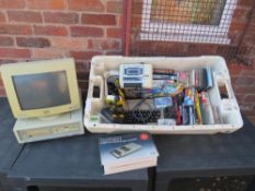 A Commodore 64 computer system together with a large selection of computer games, manuals,