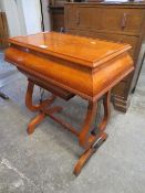 A mahogany burr wood inlaid work table with lyre shaped legs - W 66 cm