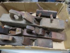 A tray of wooden block planes