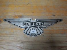 An aluminium Jaguar plaque**