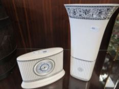 A Wedgwood small clock and a Wedgwood vase