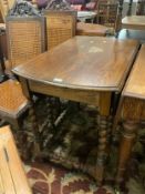 An oak barleytwist dropleaf table S/D