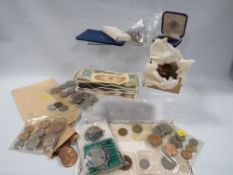 Box of mixed British and foreign coins and banknotes