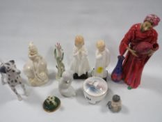 A selection of assorted figurines and ceramics to include Belleek, Royal Copenhagen, Royal Worcester