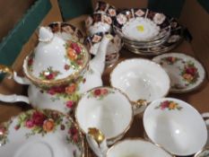 A tray of assorted tea ware to include Royal Albert old country roses