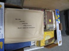 A tray of stamps both loose and in albums, tea cards, books etc