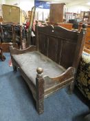 An oak made settle with padded seat - W117 cm