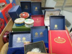 A selection of over 15 Halcyon Days and other enamelled trinket boxes, many in original boxes