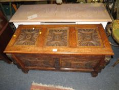 A vintage carved oak blanket chest - W 99 cm
