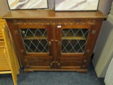 A vintage oak cased bookcase