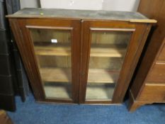 A mahogany glazed bookcase