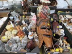 Two trays of collectables to include wade whimsies, carved tribal treen, Oriental vase etc