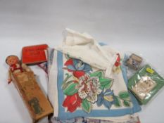 A small tray of collectables to include a small vintage clockwork Tyroleon dancing doll with key,