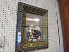 A decorative wall mirror