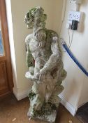 A large concrete statue / water fountain depicting Neptune