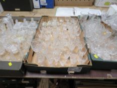 Three trays of cut glass crystal to include a table lamp