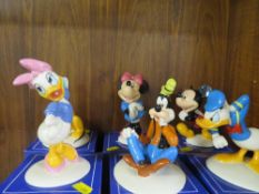 A set of six Royal Doulton Mickey Mouse collection 