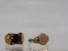 A hallmarked 9 carat gold garnet ring approx. weight 4.1g together with a 9ct gold and silver