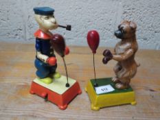 A boxing Popeye and dog figures **