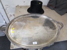 A large twin handled silver plated presentation serving tray dated 1907 together with a silk top