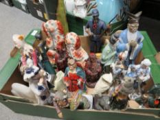 A tray of assorted figurines to include Staffordshire flatback style spaniels