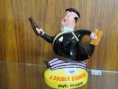 A Beswick advertising ceramic figure 