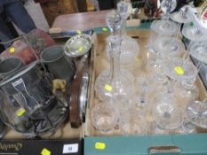A tray of assorted cut glass and decanters together with a tray of metal ware etc