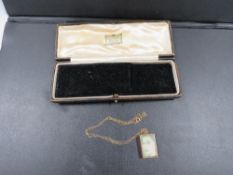 A hallmarked 9 carat gold one pound note charm on a 9kt chain approx. total weight 4.6g