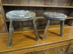 Two oak milking stools