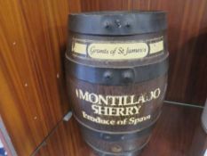 A set of 4 vintage croquet mallets and wooden sherry barrel