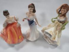 Two Royal Doulton figurines together with another (3)