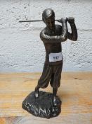 A bronze finish golfer figure **