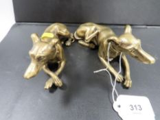 A pair of heavy cast brass greyhound dog figures