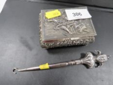 A novelty hallmarked silver button hook in the form of a jester together with a silver plated