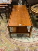 A mid-century teak two tier rectangular coffee table