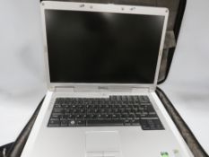 A Dell laptop with power cable plus accessories in travel bag plus number pad and cd drive