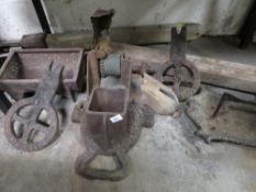 An antique tennis court net post and winder together with feeder trough, boot scraper etc