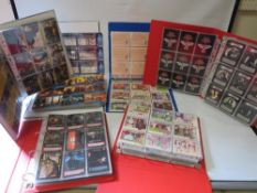 Six folders of collectors and trading cards to include The Crow, Spoofy Tunes, Godzilla,