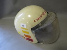 A retro style centurion 750 motor cycle helmet with visor