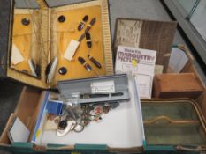 A tray of assorted collectables to include enamel buttons and badges etc