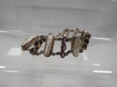 An amethyst and mother of pearl silver bracelet