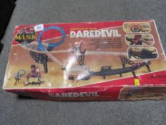 A vintage boxed mask motorised Dare Devil set (contents unchecked)