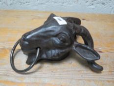 A goats head with ring **