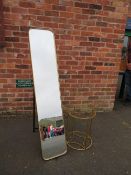 A modern gilt framed full length free standing mirror together with a gilt metal / glass topped