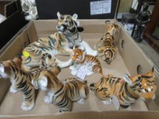 A tray of ceramic tiger figures to include Lomonosov examples