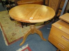 A circular pine kitchen table together with a honey pine mirror and a pine stool (3)