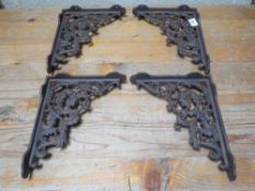Four rust effect cast wall brackets**